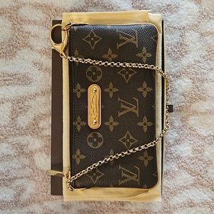 Authentic Louis Vuitton Milla clutch
